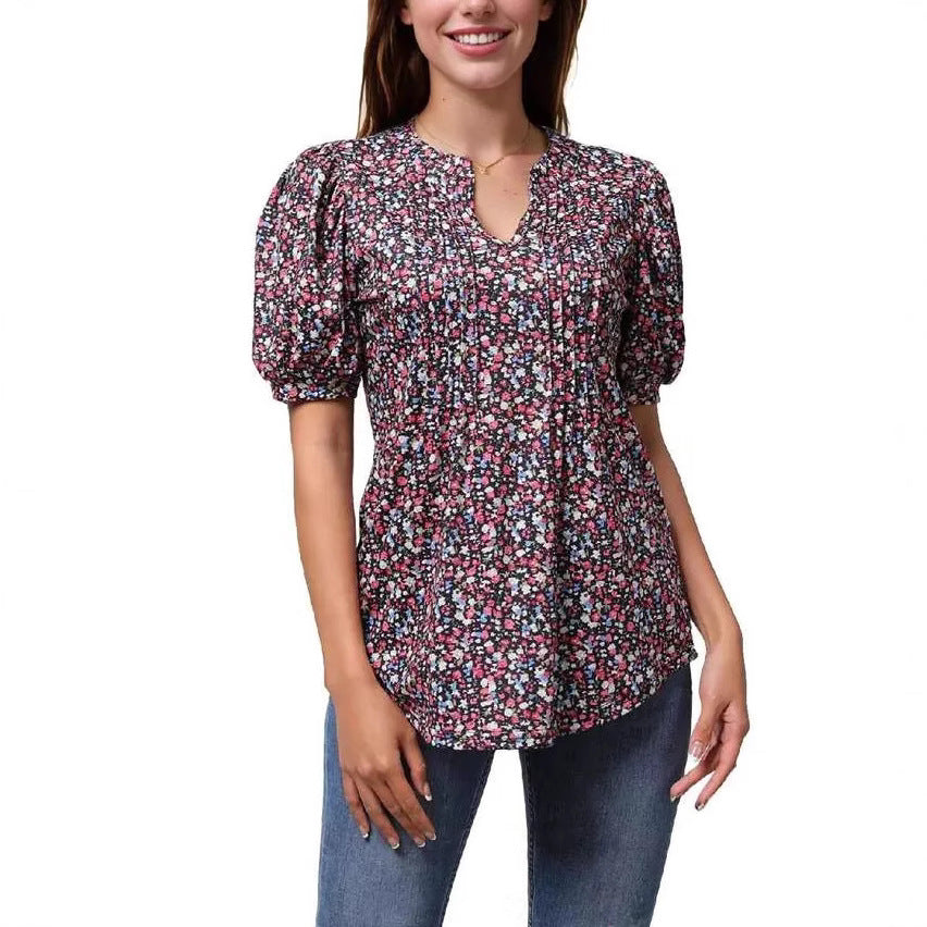 Damebluse med flæseærmer og blomsterdesign Stilla