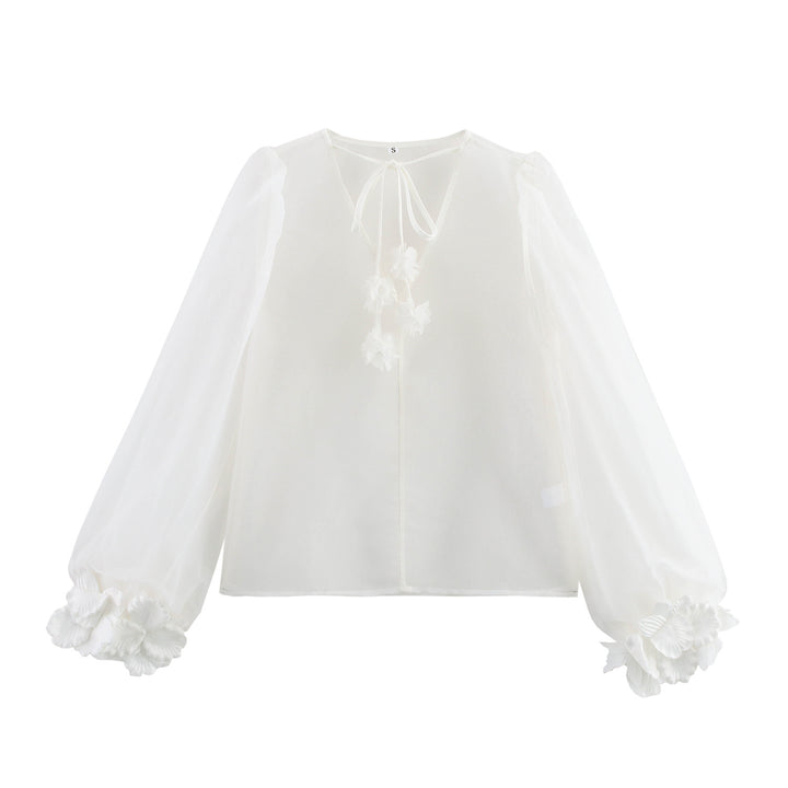 Femme Elegante Transparent Bluse med Puffærmer og Florale Accenter Stilla