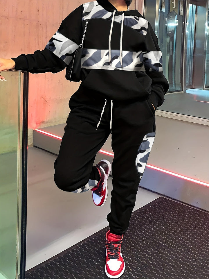 Dame sport joggingdragt med moderne camouflage-mønster og behagelig pasform Stilla