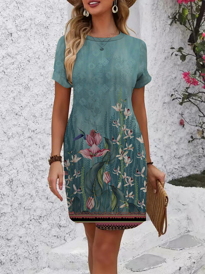 Dame casual kortærmet kjole med florale motiver og behagelig pasform Skovae