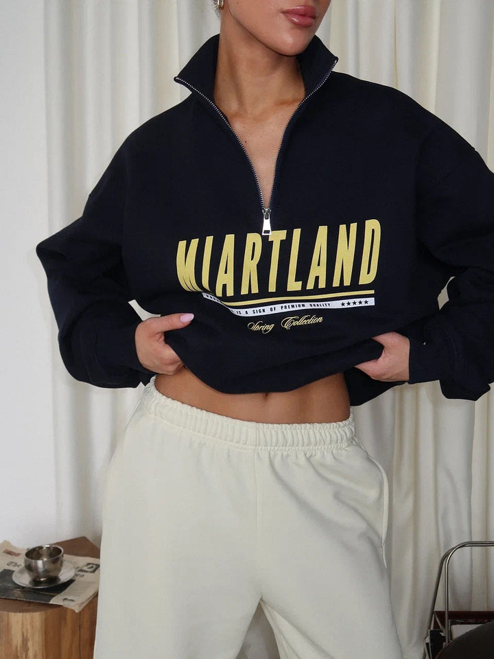 Kvindernes sporty zip pullover med oversize pasform og kreativt print Stilla