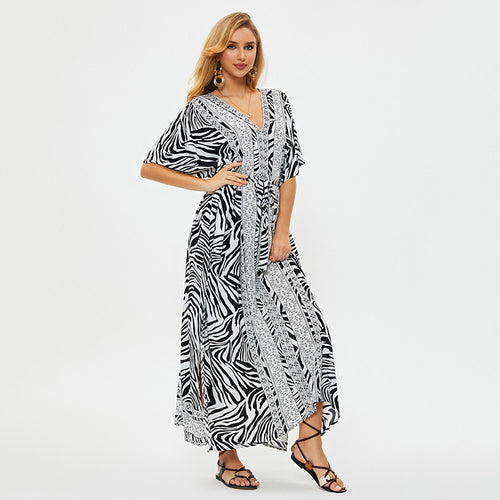 Dame maxikjole med raffineret zebra-print og sidelæns bindebånd Stilla