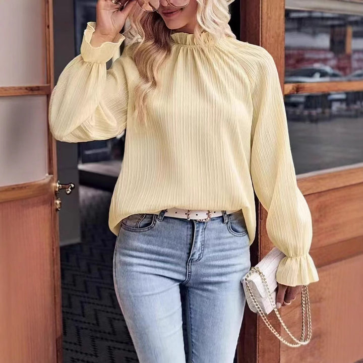 Dame flydende bluse med elegante pufærmer Stilla