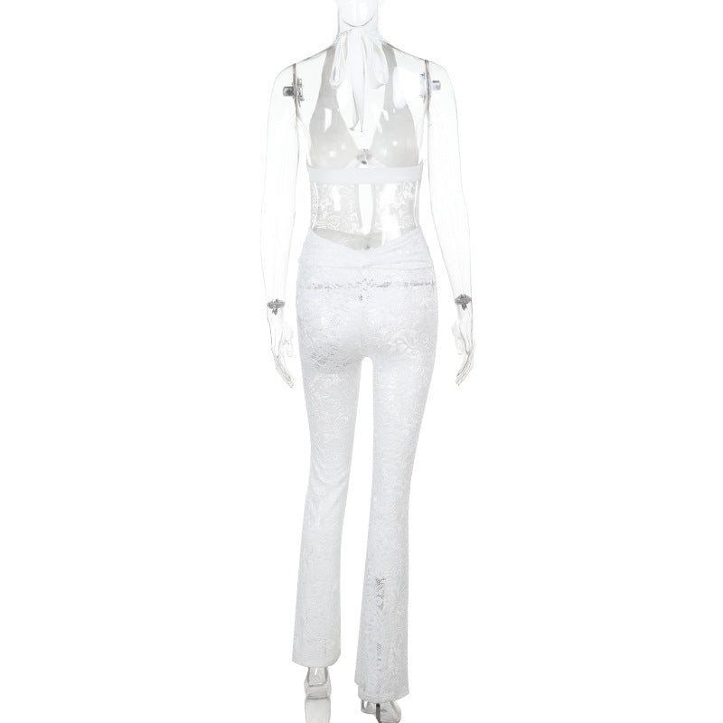 Dame jumpsuit med elegant spidsedetalje og dyb V-hals Skovae