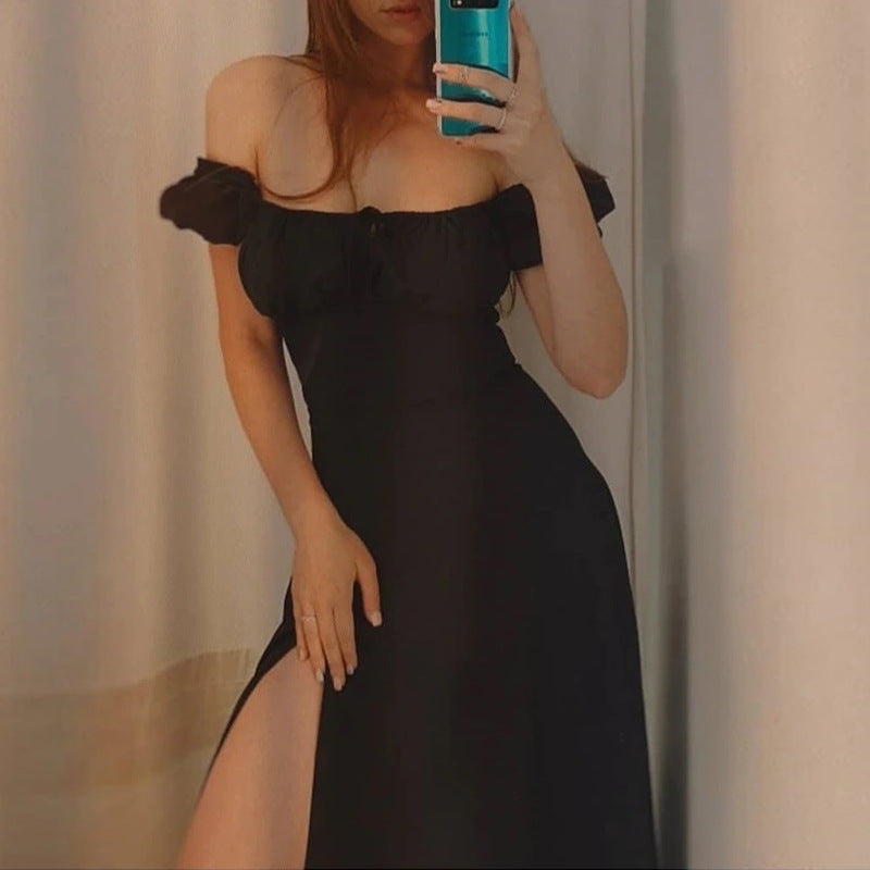 Kvindernes maxi kjole med off-the-shoulder design og voluminøse puffærmer Stilla