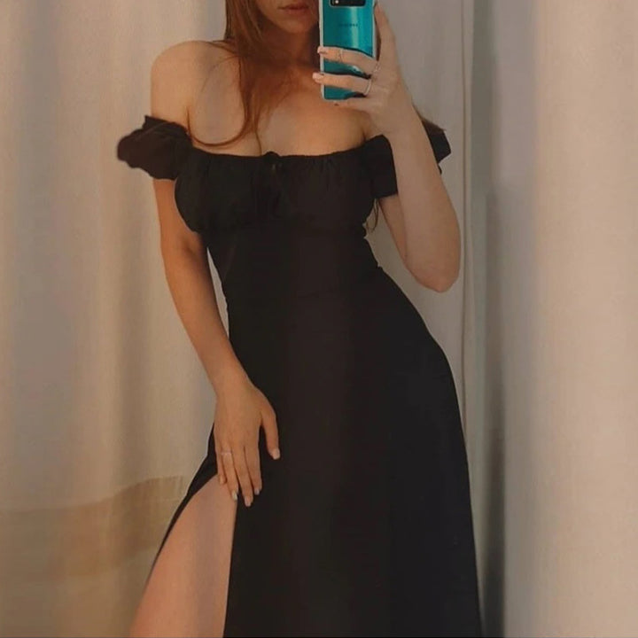 Kvindernes maxi kjole med off-the-shoulder design og voluminøse puffærmer Stilla