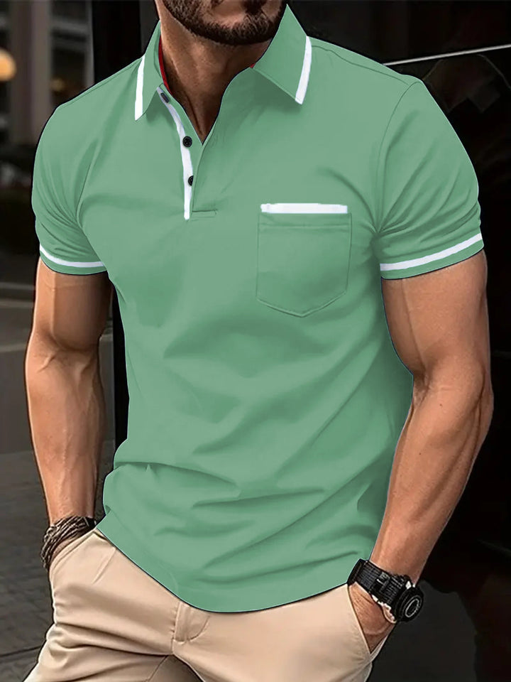 Herre poloshirt med kontrasterende detaljer og praktisk brystlomme Stilla