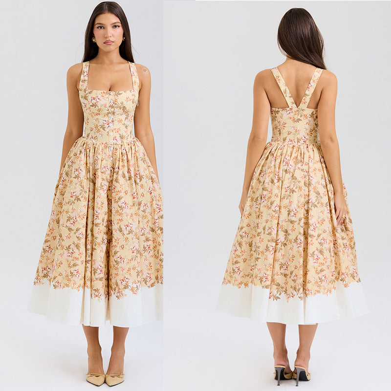 Dame Midikjole i vintage-stil med blomstertryk og svajende skørt Stilla
