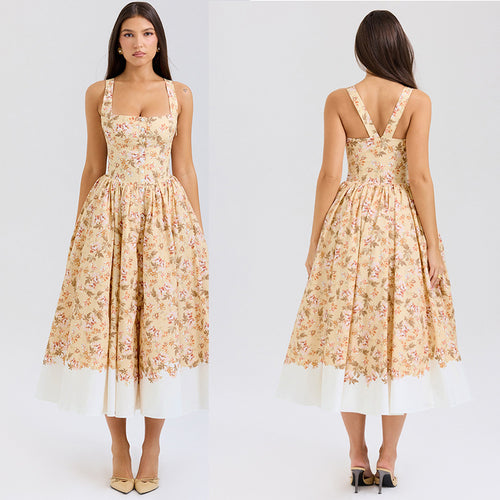 Dame Midikjole i vintage-stil med blomstertryk og svajende skørt Stilla