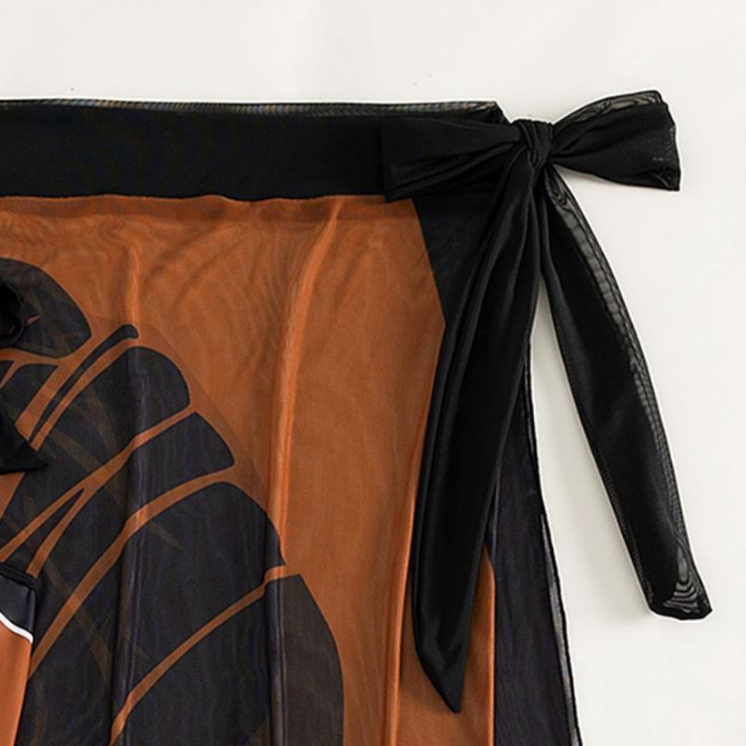 Dame badedragt med elegant skørt og moderne flæse detaljer Stilla