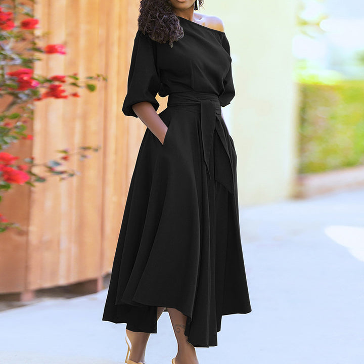 Kvinders elegante maxi kjole med off-shoulder design og bælte Stilla