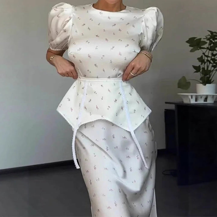 Dame elegant top med ballonærmer og legende detalje på taljen