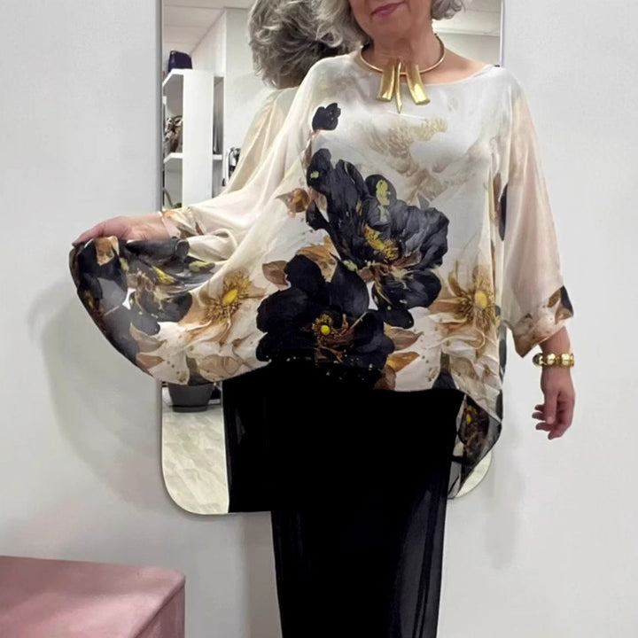 Damebluse med florale accenter og voluminøse ærmer Stilla