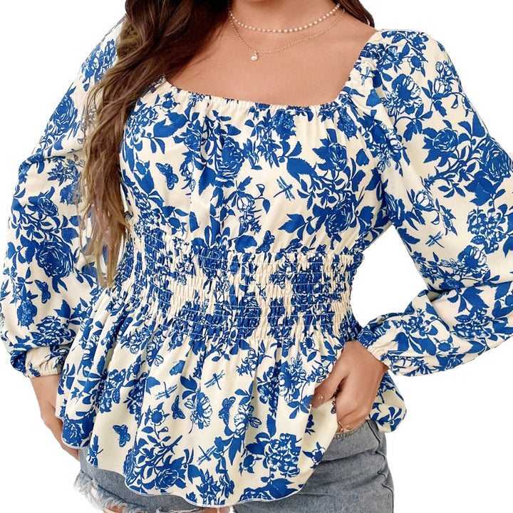 Damebluse med elastisk indsats og blomsterdesign Stilla