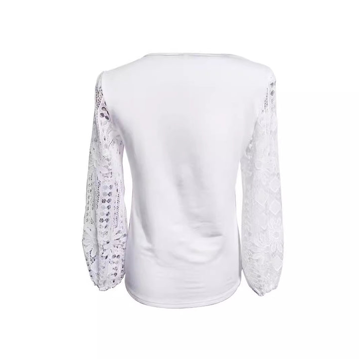 Kvinders designerbluse med blondedetaljer og elegant snit Stilla