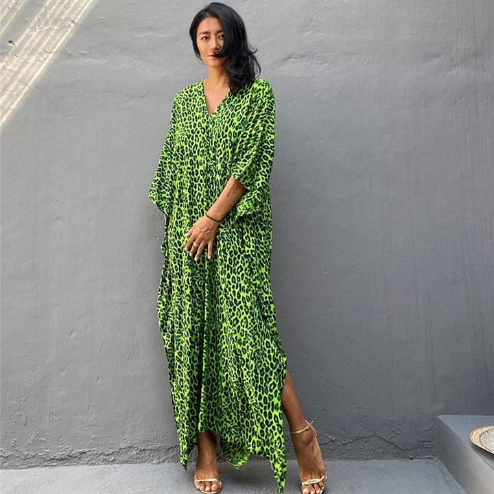 Dame Maxi-kjole med asymmetrisk snit og dyreprint Stilla