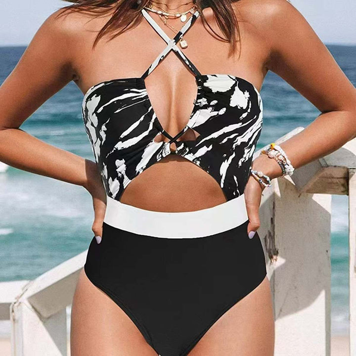 Dame én-delt badedragt med raffineret cut-out design og justerbare stropper Stilla