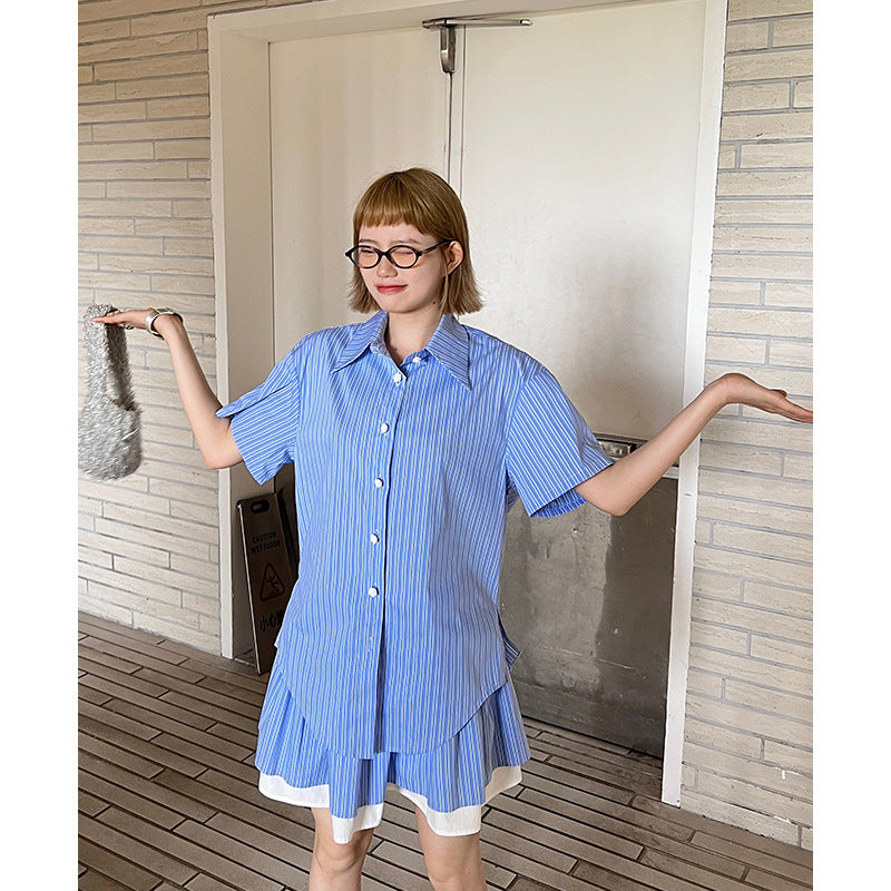 Dame Overshirt med let asymmetrisk snit og dekorative knapdetaljer Stilla