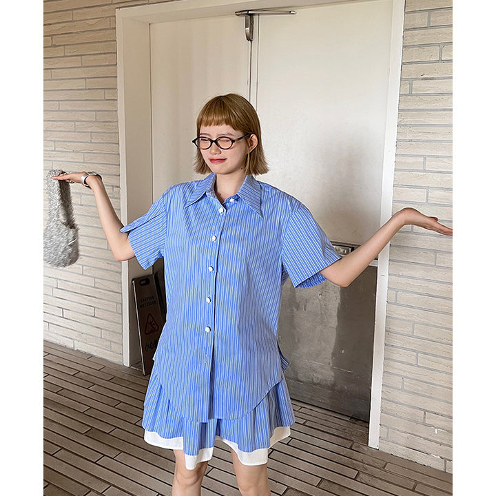 Dame Overshirt med let asymmetrisk snit og dekorative knapdetaljer Stilla