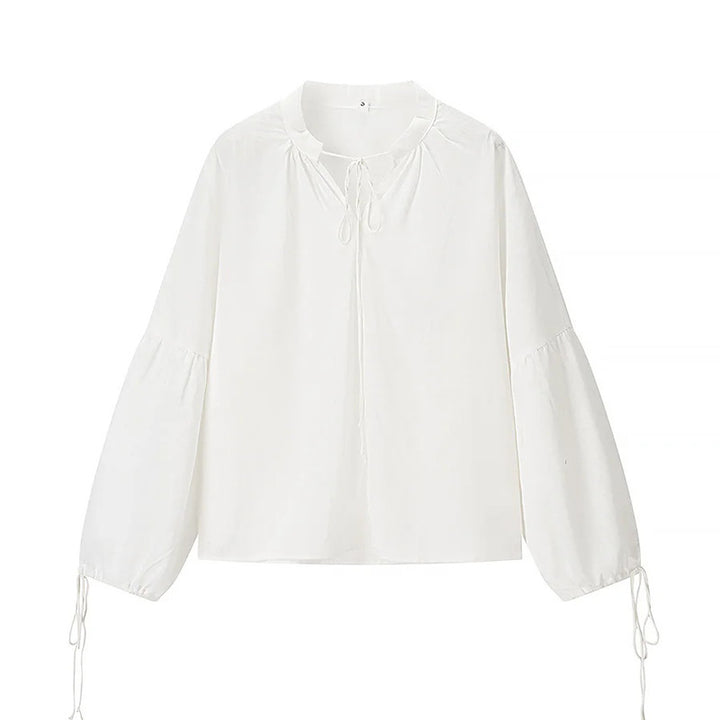 Damebluse med elegante sløjfebånd og voluminøse ærmer Stilla