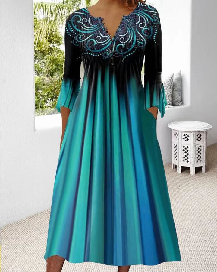 Dame midi kjole med elegant broderi og flydende snit Stilla
