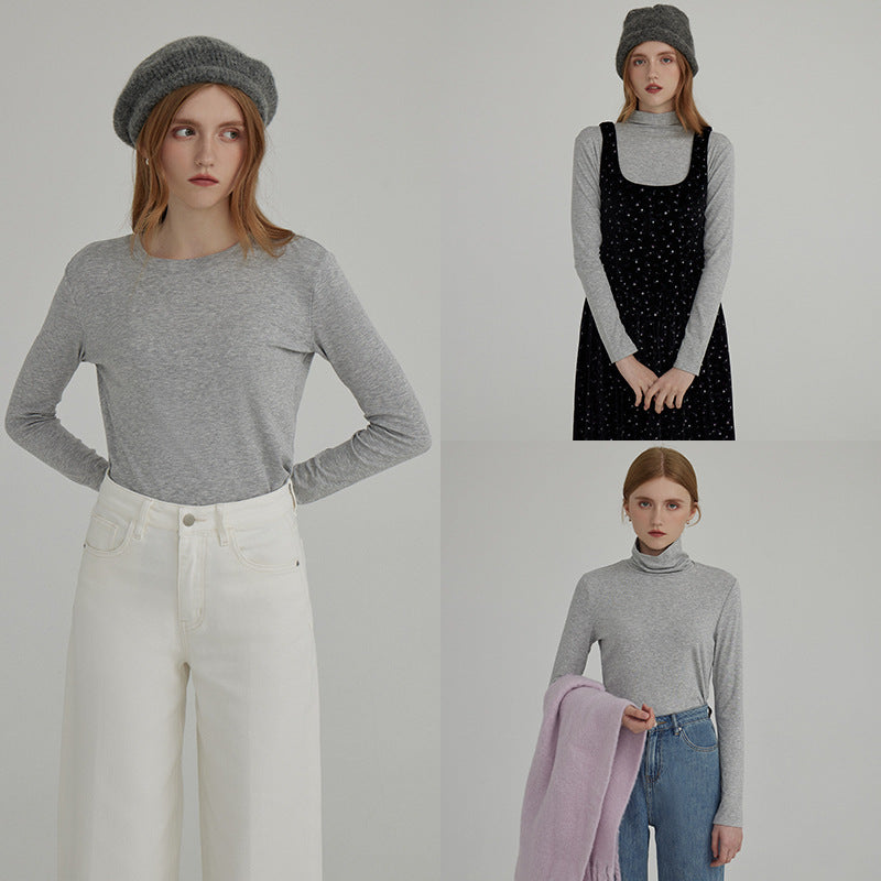 Dame langærmet bluse med moderne høj krave og minimalistisk silhuet Stilla