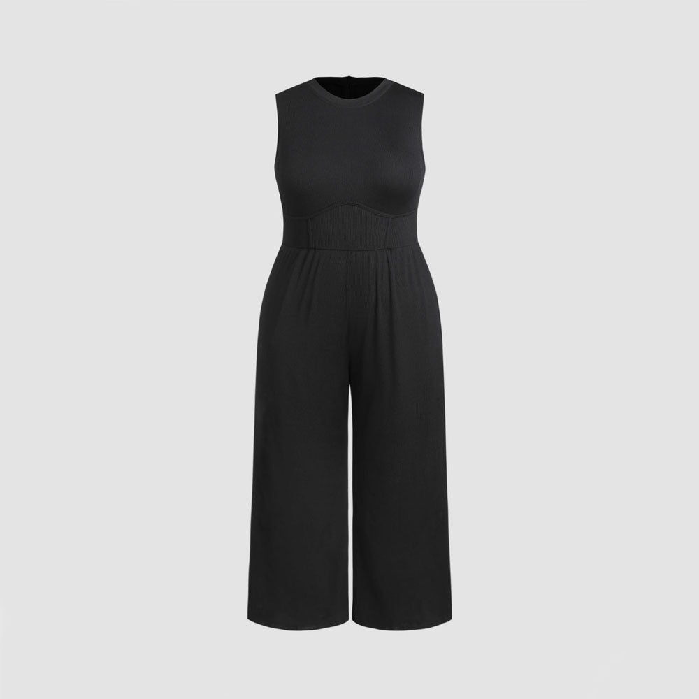 Dame jumpsuit med elegant off-shoulder design og praktiske sidelommer Skovae