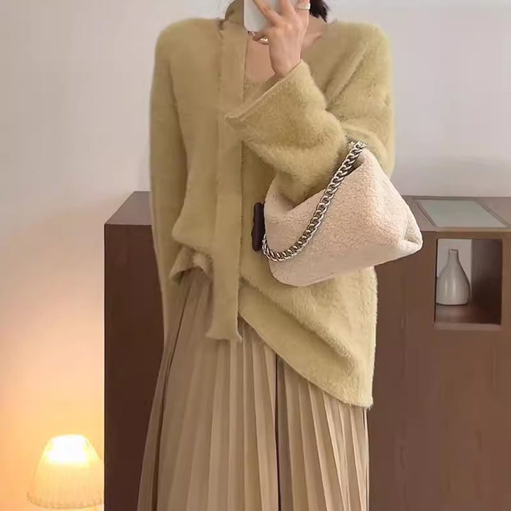 Dame grovstriktr sweater med dyb V-hals og flotte bånd detaljer Stilla