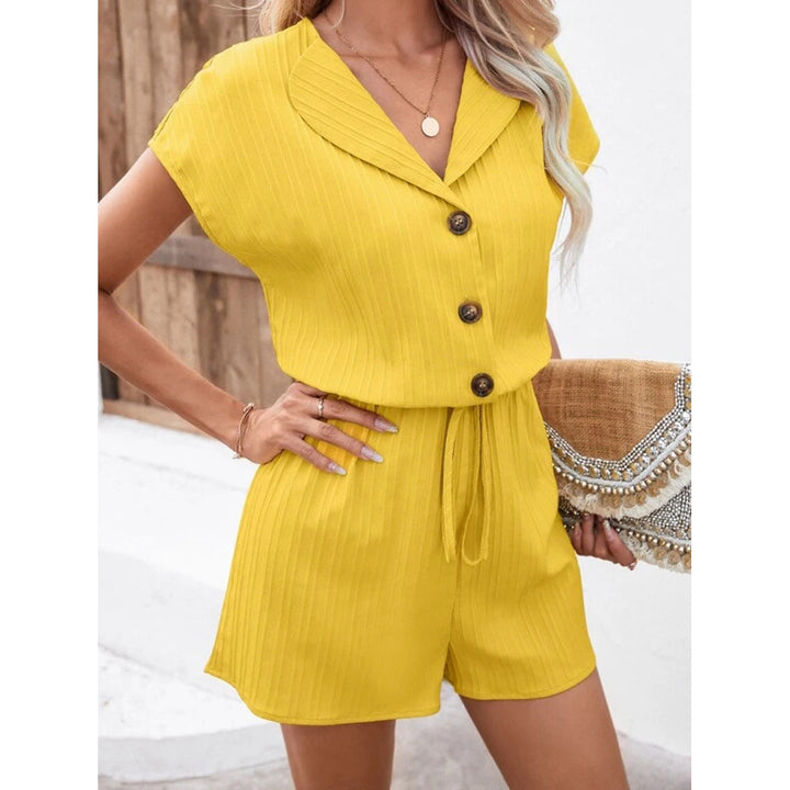 Dame jumpsuit med elegant snit og modiske knapdetaljer Stilla