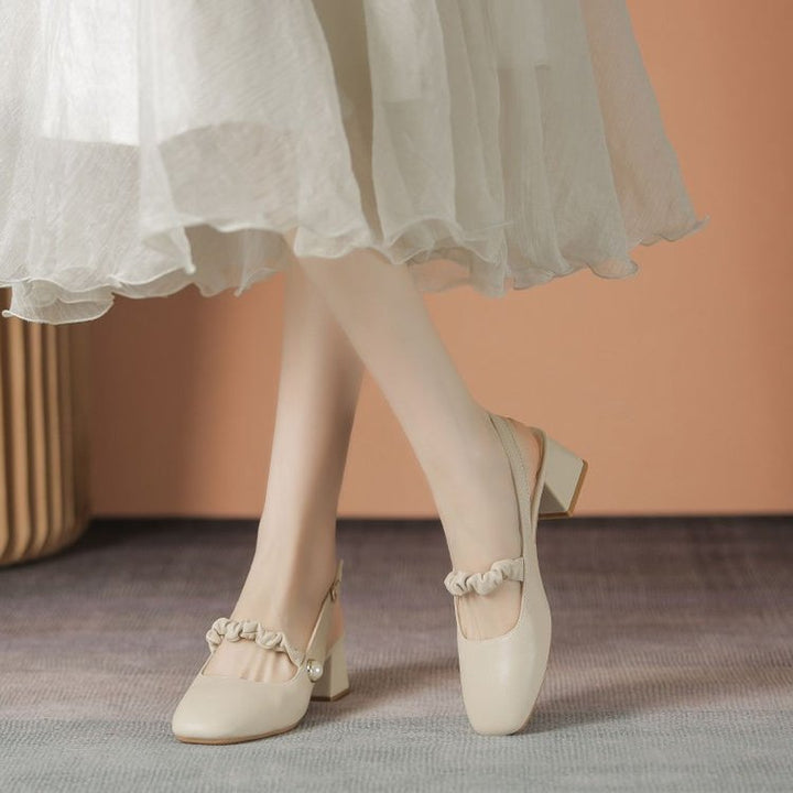 Dame elegante Slingback-pumper med moderne perlepynt og lav blokhæl Stilla