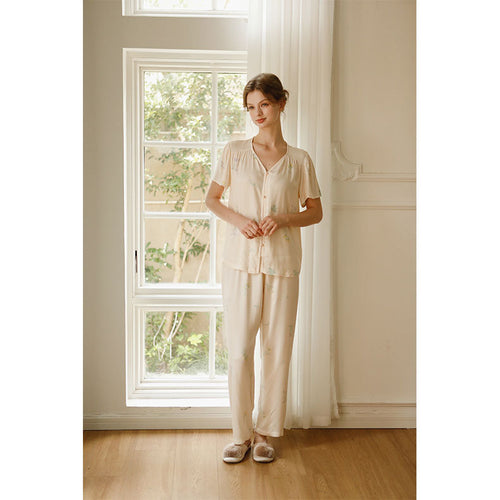Dame åndbar pyjamas-sæt med blomstret design og elegant knapliste Stilla