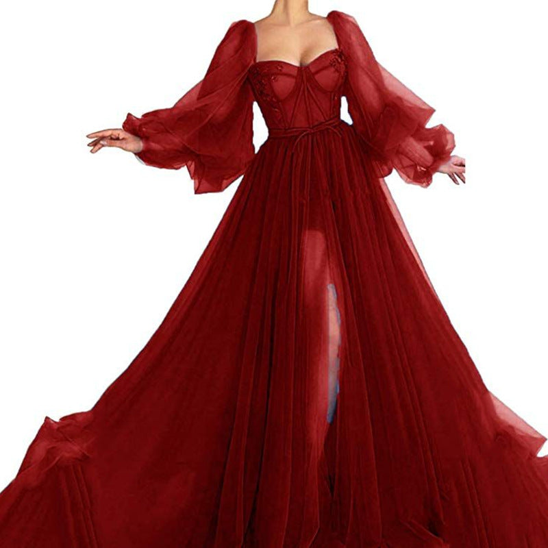 Dame Robust Aftenkjole med transparente Puffærmer og høj slids Stilla