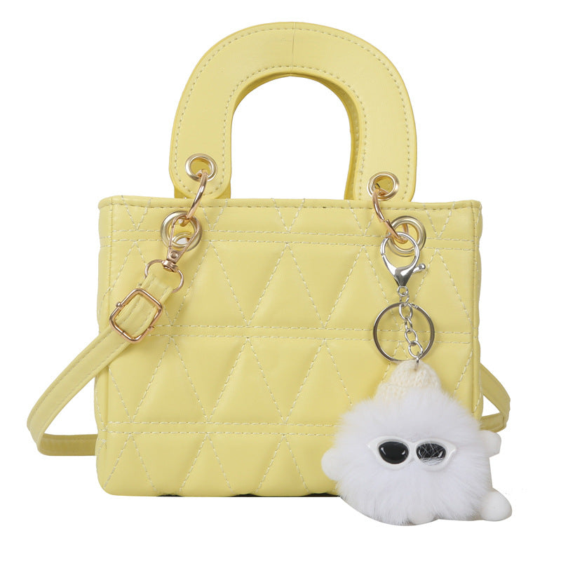 Femme quilted håndtaske med aftagelig charme Stilla