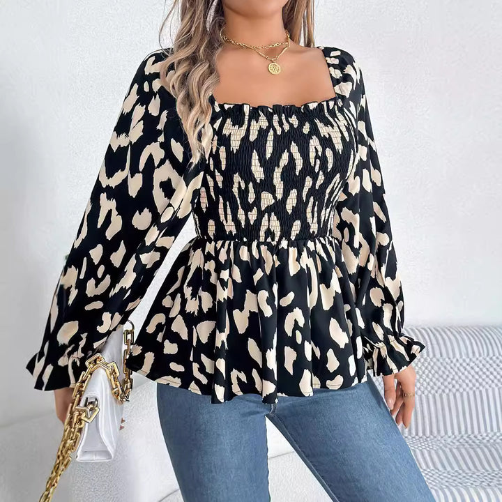 Damebluse med bred pasform og puffærmer Stilla