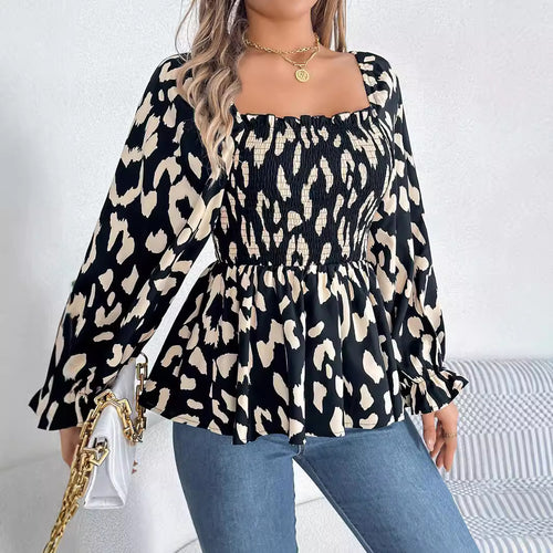 Damebluse med bred pasform og puffærmer Stilla