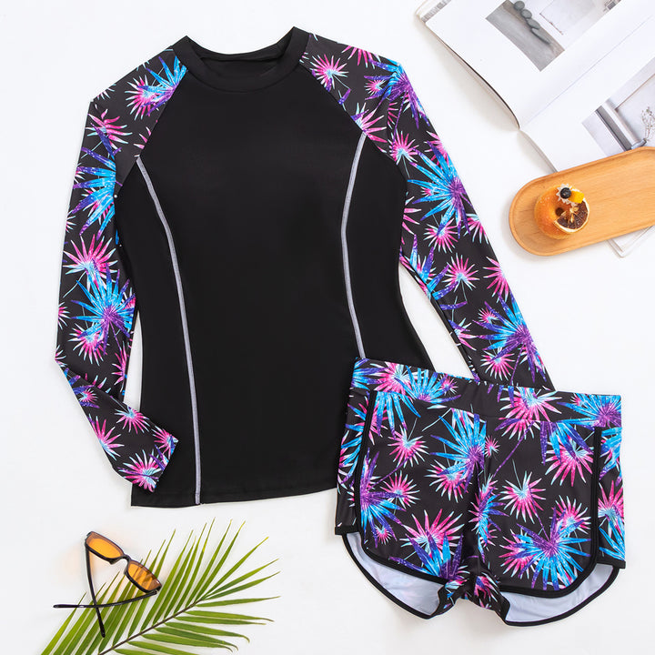 Dame Sporty Langærmet Badedragt med farverigt Palmendesign og praktisk Shorts Stilla