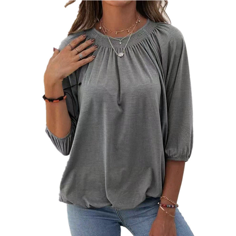Dame afslappet bluse med casual snit og elastiske pufærmer Stilla
