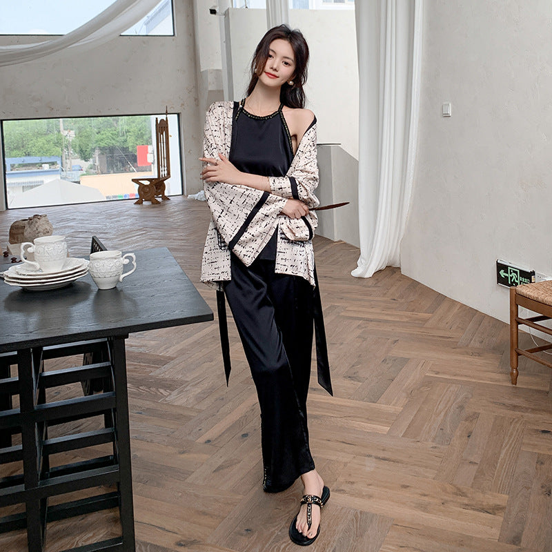 Dame kombinationsdragt med elegant indpakningslook og bredde udvidede ærmer Stilla