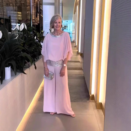 Dame Elegant kombi-outfit med flydende skær og glitrende accenter Stilla