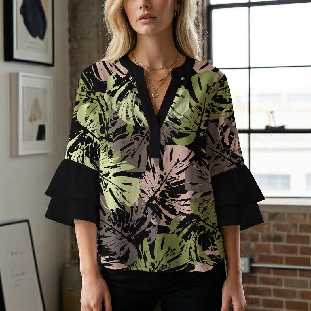 Dame bluse med voluminøse ærmer og kreativt trykdesign Skovae