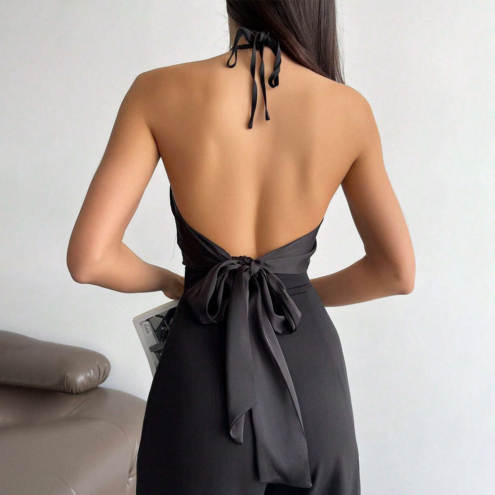 Kvinders elegante halterneck-top med blankt stof og dekorativ knude Stilla