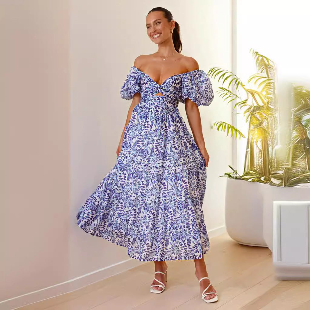 Dame maxikjole med voluminøse puffærmer og blomstret design Stilla