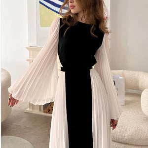 Dame elegant og asymmetrisk aftenkjole med plissé detaljer Skovae