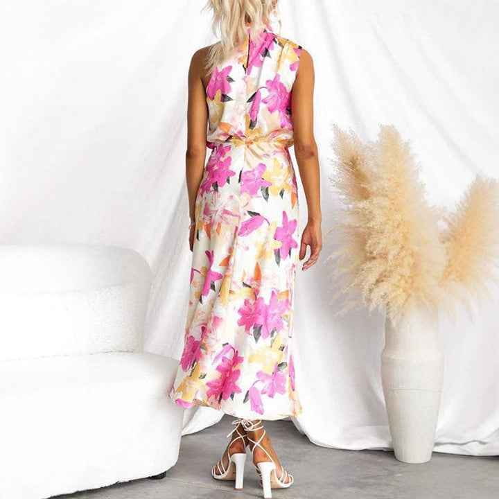 Kvindernes maxikjole med asymmetrisk top og blomsterprint Skovae