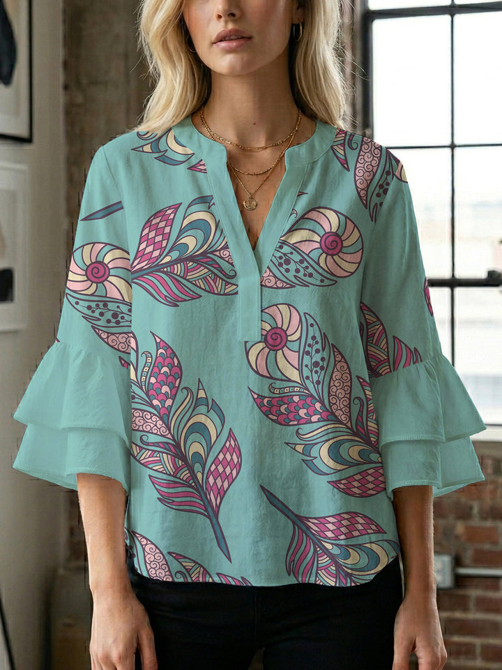 Dame bluse med voluminøse blondererm og kreativt floraldesign Skovae