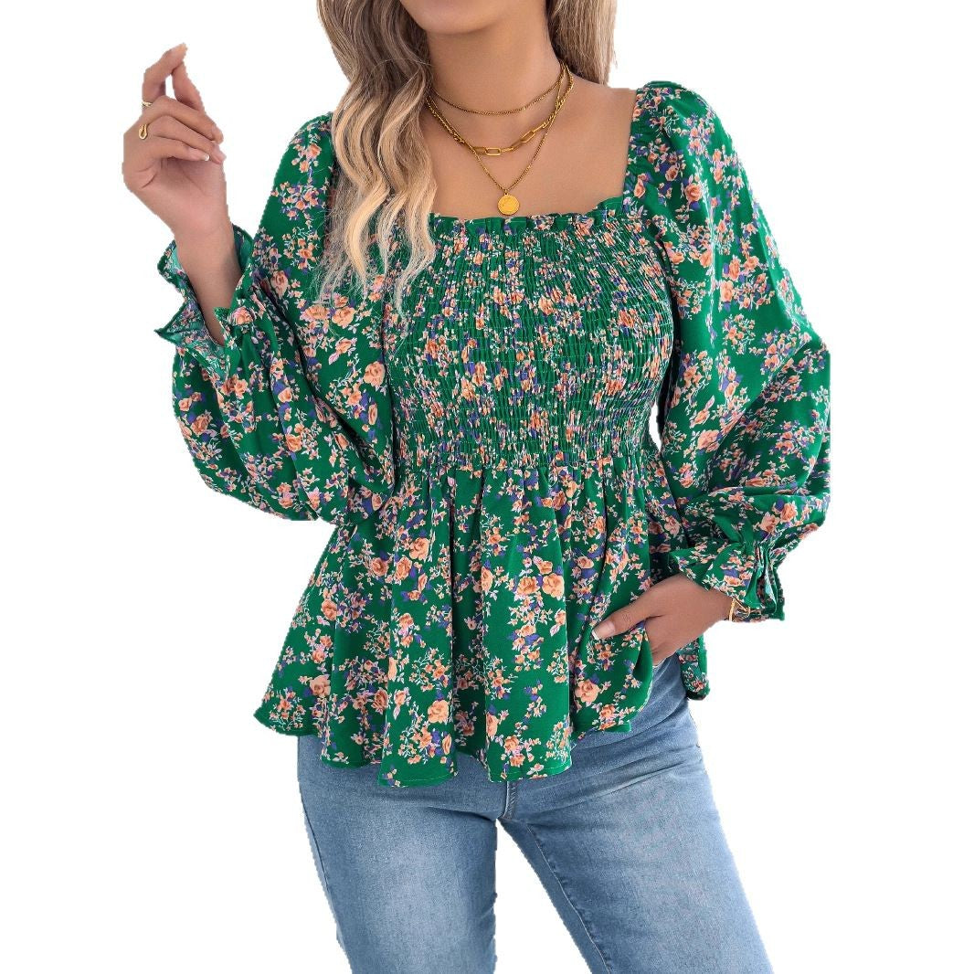 Damebluse med bred pasform og florale detaljer Stilla
