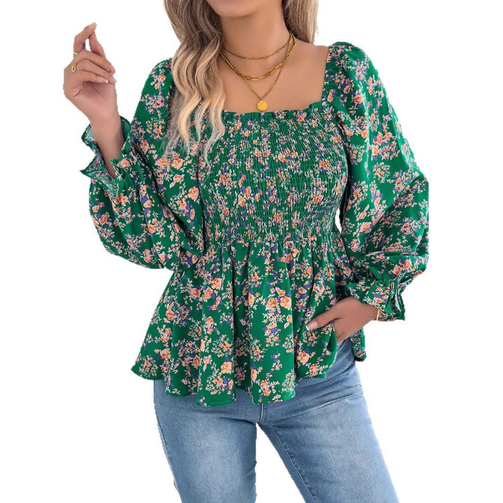 Damebluse med bred pasform og florale detaljer Stilla