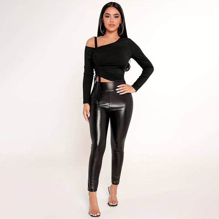 Kvindernes stilfulde crop top med asymmetrisk snit og raffinerede ruffle detaljer Stilla