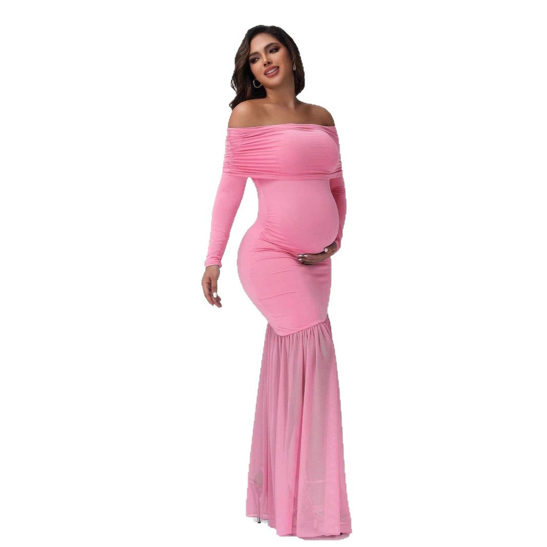 Dame Elegant gravidkjole med off-shoulder design og flydende nederdel Stilla
