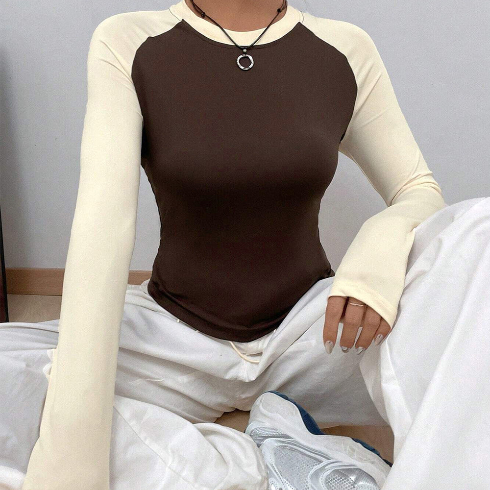 Kvindernes langærmede skjorte med moderne raglan-design og figursyet pasform Stilla
